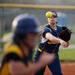 Saline pitcher Laura Vaccaro throws to first on Monday, April 29. Daniel Brenner I AnnArbor.com